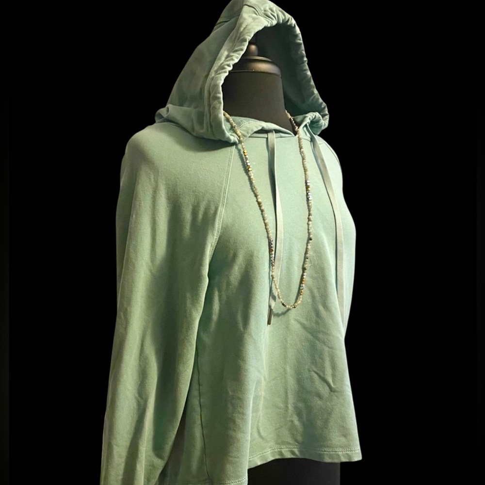 French Terry hoodie in a pretty green and size med semi fitted.